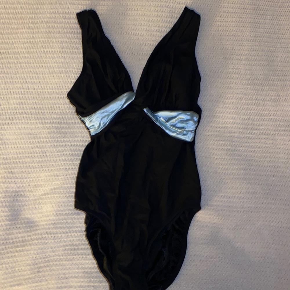 Longitude 1 piece swimsuit with built in soft bra.